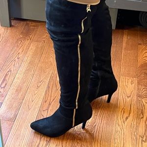 Tall black boots